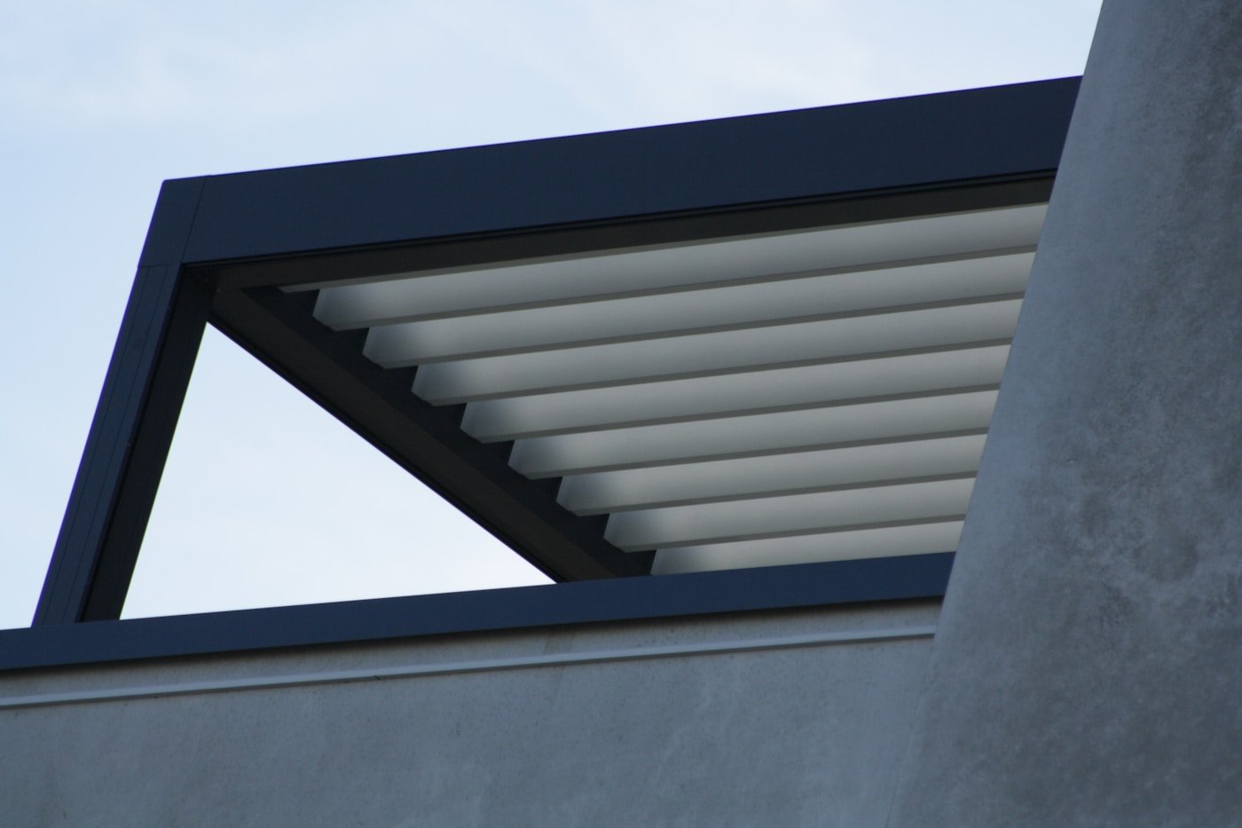 Modern louvered pergola structure for Struxure outdoor systems